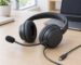 Black wired headset with boom microphone and USB-C cable on an office desk
